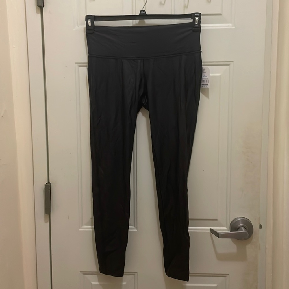 TIME AND TRU, NWT Women’s Size L faux leather leggings. 87%Nylon 13%Spandex